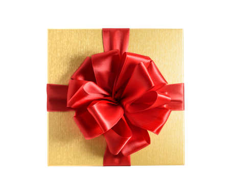 Top view golden gift box with red ribbon. Isolated on a white backgroundの写真素材