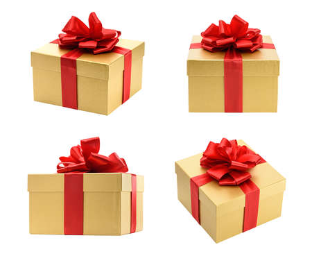 Golden gift box collection isolated on a white backgroundの写真素材