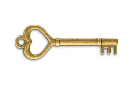 Vintage golden skeleton key isolated on white backgroundの写真素材