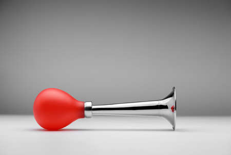 Air bicycle horn on a gray backgroundの写真素材