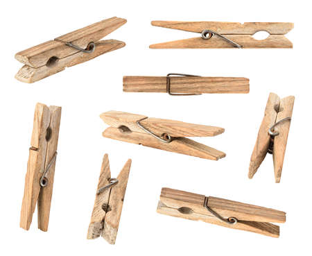 Set of wooden cloth pegs isolated on white backgroundの写真素材