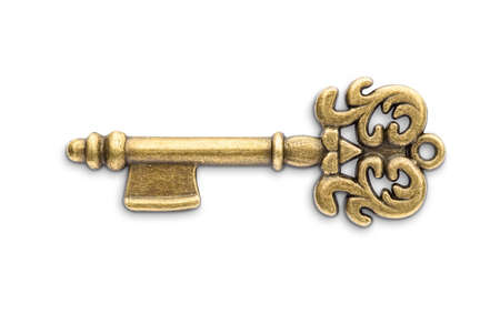 Vintage golden skeleton key isolated on white backgroundの写真素材