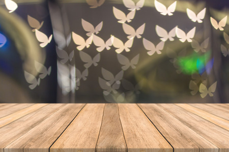 Empty wooden table space platform and blurred Bokeh Christmas Happy New Year and Valentine's Day. background for product display montageの写真素材