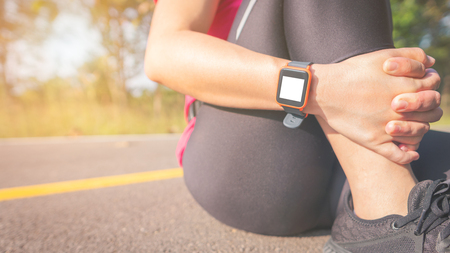 Women exercise in the morning with SmartWatch.の写真素材