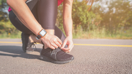 Women exercise in the morning with SmartWatch.の写真素材