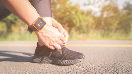 Women exercise in the morning with SmartWatch.の写真素材