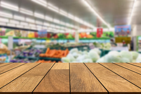 Empty old wooden and wood shelf in front of blurred background in hypermarket at department store and copy space. Can be used for display or montage for show your products.の写真素材
