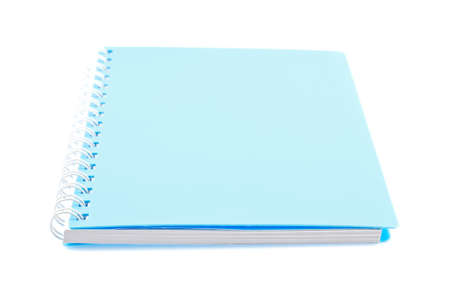 Blue book on a white background の写真素材
