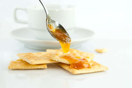 saltine crackers and jam On a white background の写真素材