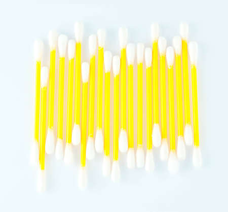 Cotton swabs over a white background 