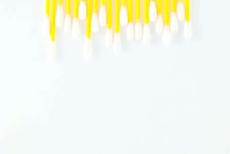 Cotton swabs over a white background の写真素材