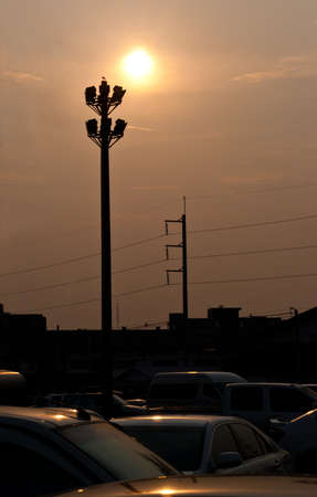 looking up to spotlights sunsetの写真素材