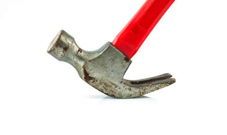 Old red hammer under the white background