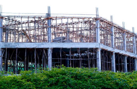 Construction site with enforced concrete steel frames rising up