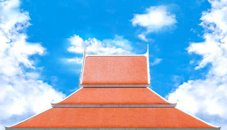 red rooftop against blue sky