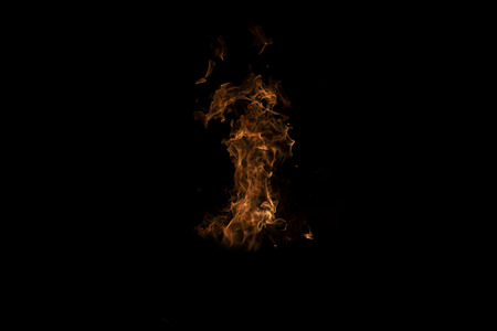 Fire flames on Abstract art black background, Burning red hot sparks rise from large, Fiery orange glowingの写真素材