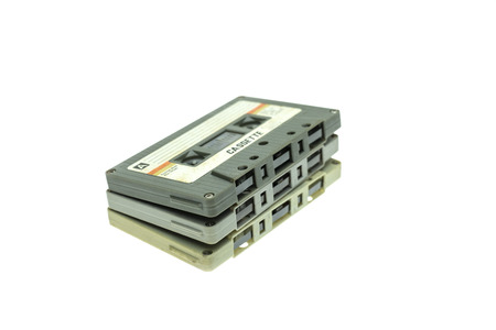 Vintage compact cassette tape on white background, Close up set of old audio tapesの写真素材