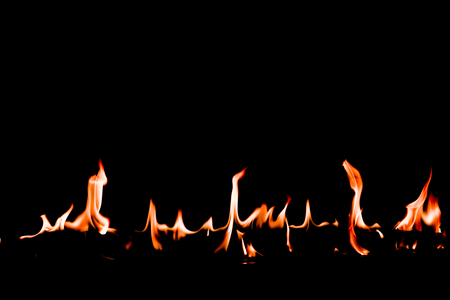 Fire flames on Abstract art black background, Burning red hot sparks rise, Fiery orange glowing...