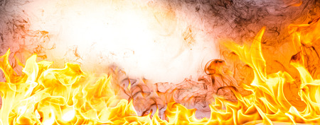 Fire flames on Abstract art black background, Burning red hot sparks rise, Fiery orange glowing...