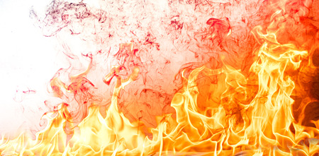 Fire flames on Abstract art black background, Burning red hot sparks rise, Fiery orange glowing...