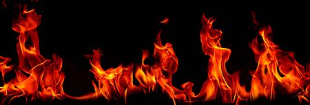 Fire flames on Abstract art black background, Burning red hot sparks rise, Fiery orange glowing...