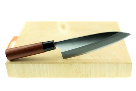 kitchen knife and wood butcher block countertop on white background