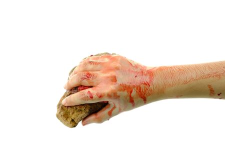 Close up hand is holding stone bloody at white background