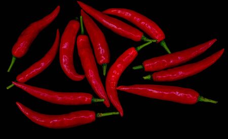 Group of Red Hot chili pepper at black backgroundの写真素材