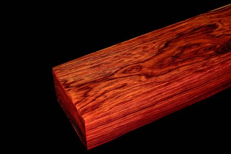 Logs of Burmese rosewood exotic wooded beautiful pattern for crafts at black backgroundの写真素材