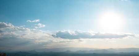 Beautiful sun sky cloud at the mountain range and the city in the background, Photo Loei  city Thailand from Phu Bo Bit mountain peakの写真素材