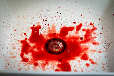 Many blood dripping into the washbasin in the bathroom, bloody and  sinkの写真素材