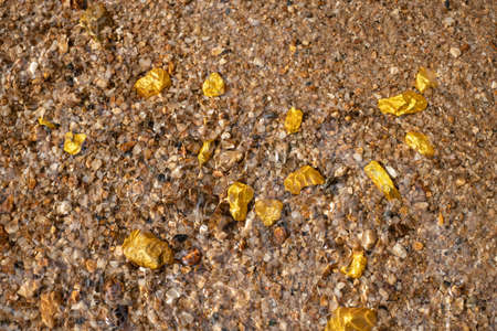Pure gold nugget ore found in mine with natural underwater sourcesの写真素材