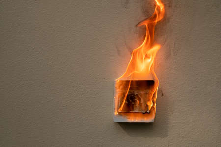 On fire switch electric shock on concrete wall