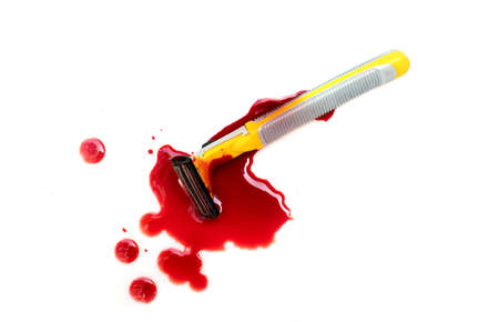 Razor bloody and drop blood on white backgroundの写真素材