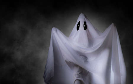 Scary white ghost at big eye for Halloween concept with clipping pathの写真素材