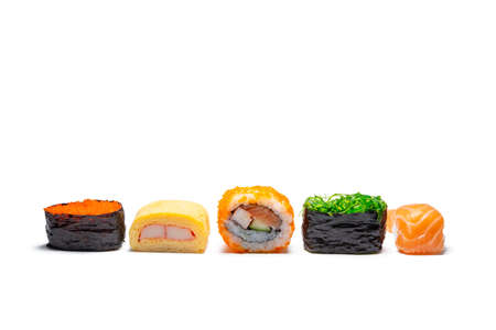 sushi rolls on a white background with copy space, Fresh hosomaki pieces with rice and nori. Closeup of delicious japanese food with sushi roll.の写真素材
