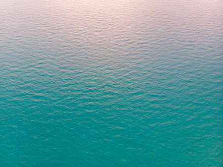 Aerial view of bright light blue transparent clean Water