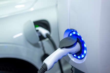 EV or Electric Vehicle Charging Energy From Charging Cableの写真素材