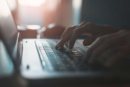 Young woman using a social media marketing concept on laptop computer with notification icons of...