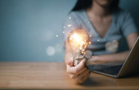 thinking and creative concept, Close up the light bulb and working on the desk, Creativity, and...