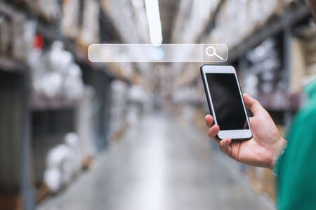 Businessman using phone searching Browsing Internet Data Information.Networking Concept,Searching information data on internet networking concept.の写真素材