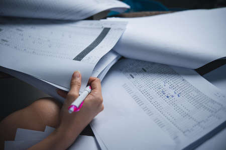 Secretary works remotely from home in quarantine, lockdown covid 19 coronavirus. Remote work, stay home, new normality, social distance.の写真素材