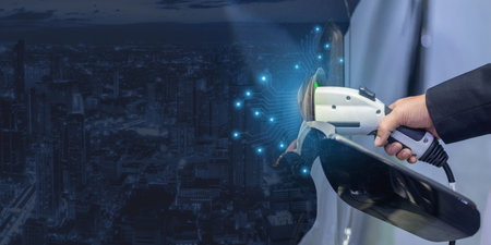 Energy EV car concept. Futuristic hybrid vehicle charge battery electric on station blur cityscape...