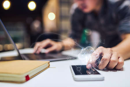 Concept of digital screen,virtual connection icon,diagram,graph interfaces, Handsome man using...