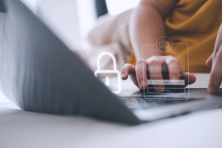 concepts for data protection using cybersecurity and privacy. Internet network security technology and the lock icon. Businessmen securing personal information on laptops and online platforms.の写真素材