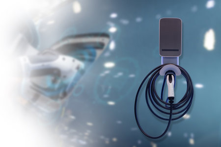 EV charging stations for electric vehicles are designed with the idea of using eco-power generated from sustainable sources to supply the stations and lower CO2 emissions.の写真素材