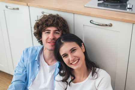a young couple Happy and in a good mood couple smiling happily inside the house.の写真素材