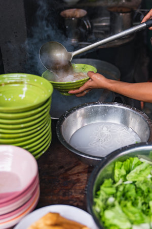 cooking, hot and sour soup, fish ball noodles, and thai cuisineの写真素材