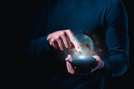 An executive uses a smartphone on the go. Big data, digital marketing, financial and banking, and business global internet connection application technologies.の写真素材