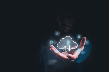Man holding cloud icon with security symbols, representing cloud computing, data protection, and...